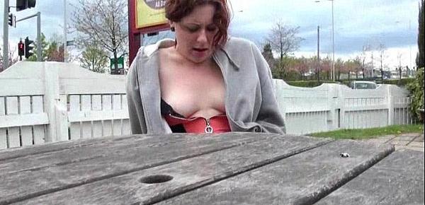  Upskirt and voyeur of English redhead amateur in public
